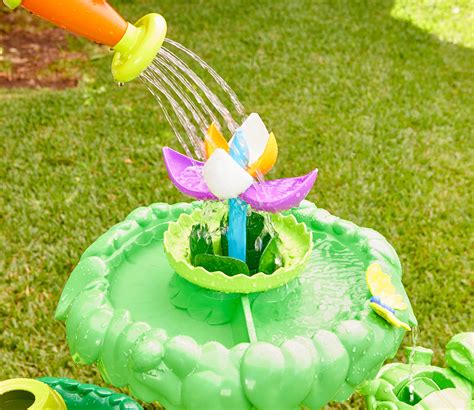 Adding a Touch of Whimsy: Incorporating Fairy Gardens into Magic Flower Water Tables